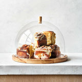 Tabla de servir redonda de madera de fresno Arla con tapa acrílica.