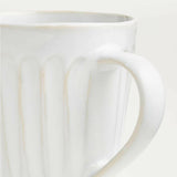 Taza blanca de Dover.