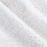 Alfombrilla de baño blanca de algodón orgánico Loop.