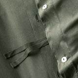 Funda nórdica de algodón orgánico Ficus verde con flecos de pestañas.