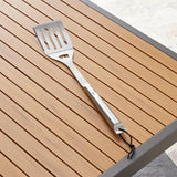 Espátula de parrilla de acero inoxidable.