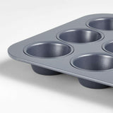 Crate & Barrel Slate Blue 12-Cup Muffin Pan.
