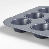 Crate & Barrel Slate Blue 12-Cup Muffin Pan.