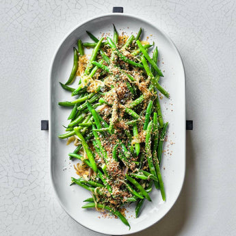 Oven-to-Table Oval Platter with Black Wood Trivet.