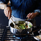 High-quality stainless steel sauté pan ideal for even heat distribution and professional cooking