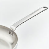 High-quality stainless steel sauté pan ideal for even heat distribution and professional cooking