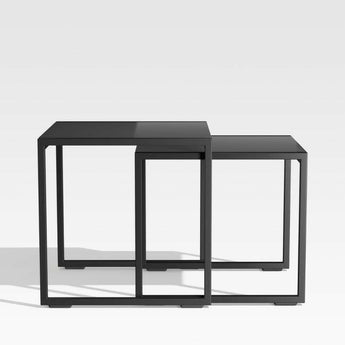 Dune Black Outdoor Nesting Tables with Black Painted Glass, Set of Two.