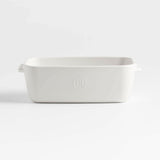 Emile Henry x Crate & Barrel Cream Ceramic Loaf Pan.