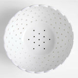 Large White Scallop Eyelet Stoneware Colander by Laura Kim.