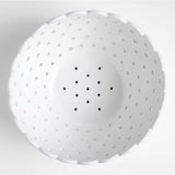 Large White Scallop Eyelet Stoneware Colander by Laura Kim.