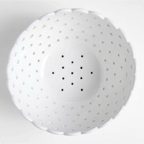 Large White Scallop Eyelet Stoneware Colander by Laura Kim.