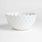 Large White Scallop Eyelet Stoneware Colander by Laura Kim.