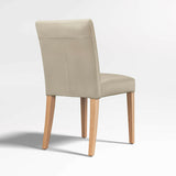 Lowe Bone Leather Dining Chair with Natural Wood Legs.