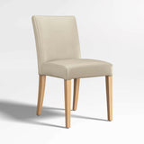Lowe Bone Leather Dining Chair with Natural Wood Legs.