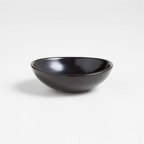 Mini ceramic bowl featuring intricate design, ideal for serving or decorative purposes