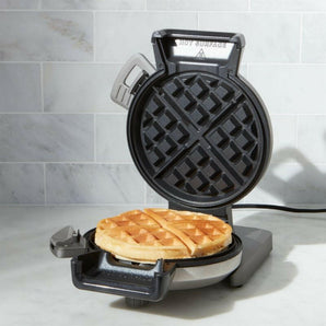 mini waffle machine with waffle in the middle