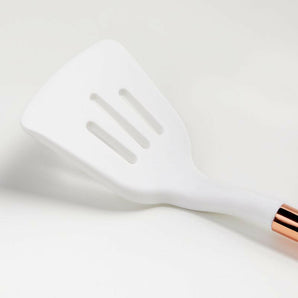 Ada White Silicone Slotted Turner with Copper Handle.