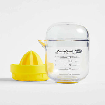 Crate & Barrel Mini Citrus Juicer with Cup.