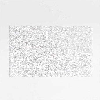 Alfombrilla de baño blanca de algodón orgánico Loop.