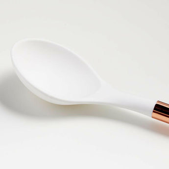 Cuchara blanca y cobre de Ada.