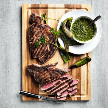 Tabla de cortar de madera de teca reversible Crate & Barrel 20 "x15" x0.75".