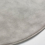 Mantel individual redondo Maxwell de fácil cuidado.