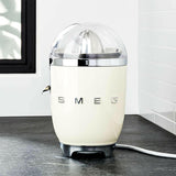 Exprimidor de Cítricos Estilo Retro - Crema SMEG Multicolor.