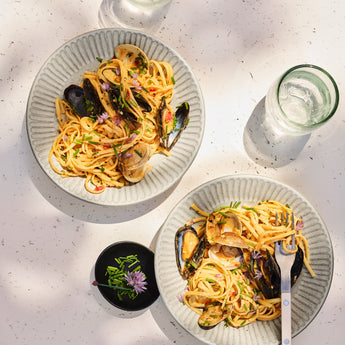 Elegant Serving Bowls and Baskets from Crate & Barrel, perfect for stylish home dining and organization