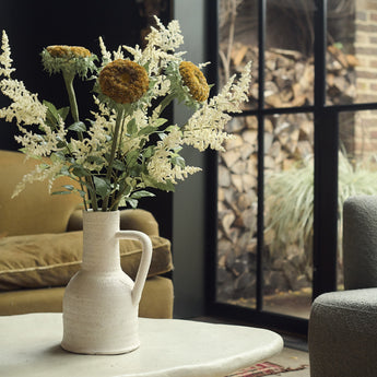 Elegant ceramic vases available at Crate & Barrel, perfect for stylish home décor and floral arrangements.
