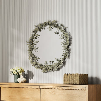 Elegant wall decor featuring mirrors from Crate & Barrel, perfect for enhancing home interiors with style and sophistication.