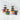 Crate & Barrel 8-Piece Round Glass Storage Containers with Dark Wood Lids.