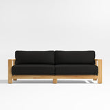 Anguilla 90" Teak Outdoor Sofa with Black Cushions.