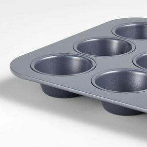 Crate & Barrel Slate Blue 12-Cup Muffin Pan.