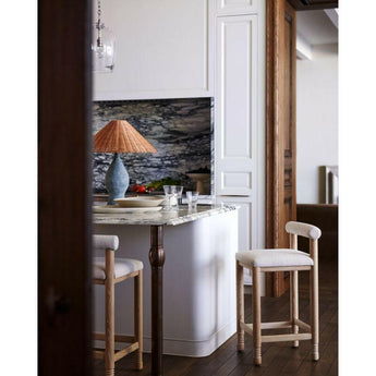 Revival Boucle Oak Counter Stool by Athena Calderone.