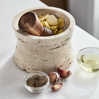 Mortar and Pestle by Eric Adjepong.