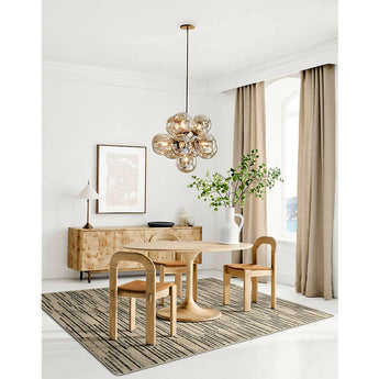 Nero 60" Natural Wood Oval Dining Table.