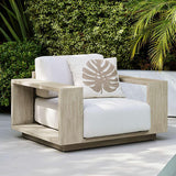Mallorca Wood Outdoor Lounge Chair with Taupe Cushion.
