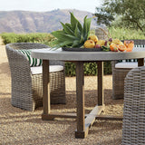 Abaco Resin Wicker Outdoor Dining Chair with White Sand Sunbrella ® Cushion.