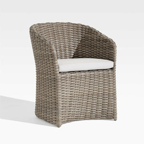 Abaco Resin Wicker Outdoor Dining Chair with White Sand Sunbrella ® Cushion.