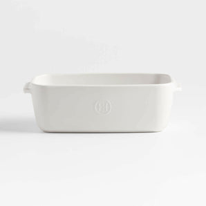 Emile Henry x Crate & Barrel Cream Ceramic Loaf Pan.