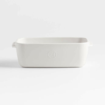 Emile Henry x Crate & Barrel Cream Ceramic Loaf Pan.