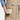 Oslo Cross-Back Natural Beige Apron with Pocket.