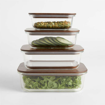 Crate & Barrel 8-Piece Rectangular Glass Storage Containers with Dark Wood Lids.