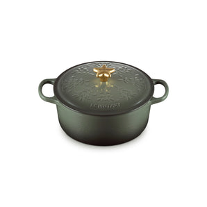 Le Creuset Cast Iron Christmas Round Casserole with Gold Star Knob and Tree Relief