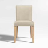 Lowe Bone Leather Dining Chair with Natural Wood Legs.