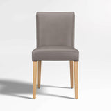 Lowe Bone Leather Dining Chair with Natural Wood Legs.